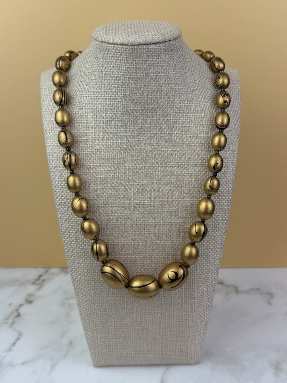 Vintage Mid-Century Molded Resin Oval Bead Necklace 23" Gold Swirl Strand